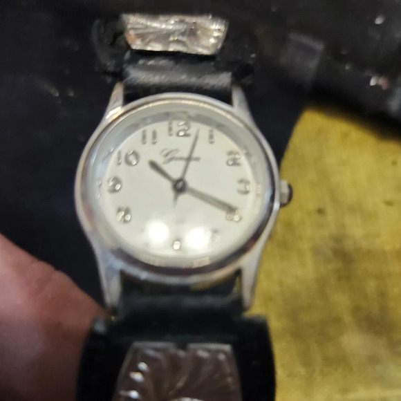 GENEVA Quartz With a SilverToned accented leather strap